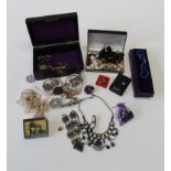 A collection of vintage and contemporary costume jewellery to include a number of vintage