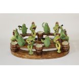 Jerome Massier - a mid 20th century majolica glazed frog chorus. 46cms wide. Signed to base.