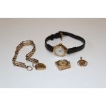 A collection of 9ct gold jewellery and other items. Comprising a 9ct gold gate bracelet with heart