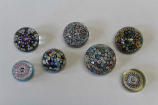 A 20th century jumbled millefiori cane paperweight, 7.5cm diameter, a larger signature cane