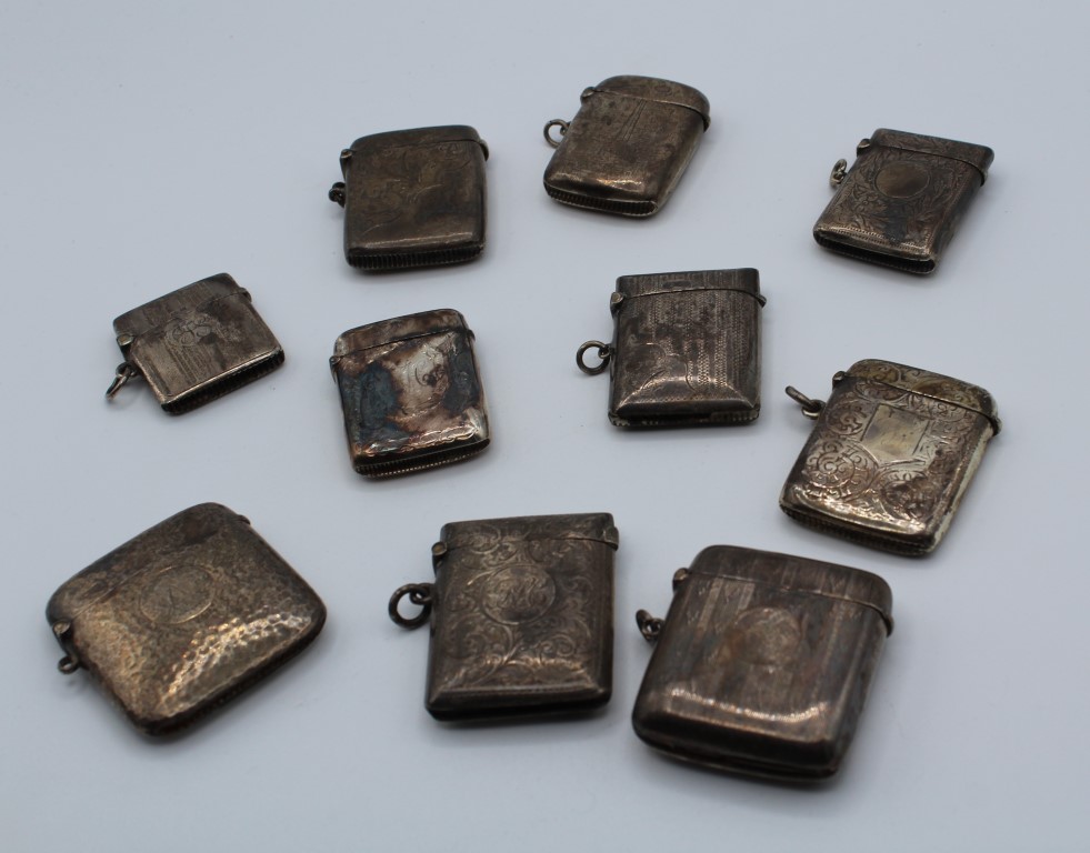 A collection of ten late 19th century/ early 20th century silver vesta cases, each of rectangular