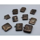 A collection of ten late 19th century/ early 20th century silver vesta cases, each of rectangular