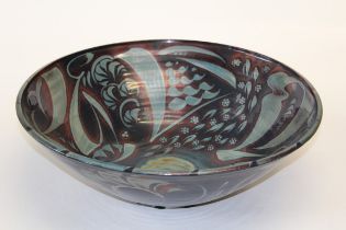 Alan Caiger- Smith 1930 -2020 British  A large deep circular pottery bowl. The iridescent blue/brown