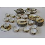 An early 20th century Royal Doulton Coaching Scenes tea service, comprising twelve cups and saucers,