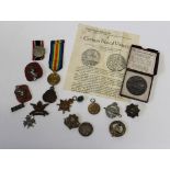 A collection of medals comprising a German 1937 medal for annexation of the Sudetenland, a 1936