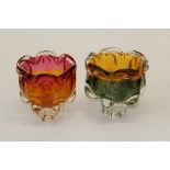 Two mid century Czechoslovakian glass footed bowls, each of organic form, amber/ cranberry and