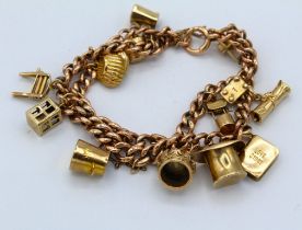 A precious yellow metal charm bracelet, featuring fourteen charms, testing as 9ct gold,