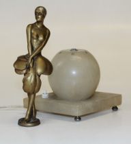 An Art Deco table lamp, surmounted with a cast gilt metal feather dancing girl after Alexandre