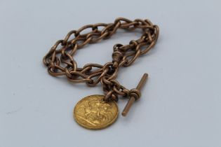 A 9ct gold Albert watch chain, with an 1887 Melbourne mint Victoria gold sovereign, attached by a