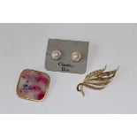 A small lot of costume jewellery featuring a pair of faux pearl Christian Dior studs, on a CD