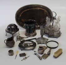 A mixed lot of EPNS including a six bottle cruet, wine cooler, muffin dish and other wares