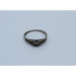 A platinum and diamond Art Deco style ring, size N. Gross weight approximately 2.52gm