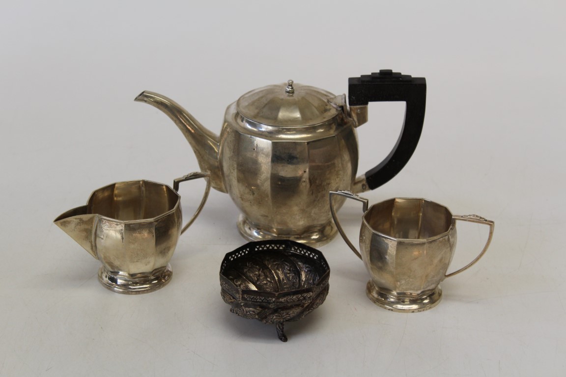 An Art Deco tea set, marked '' Sterling J N S'' to the base. Tea pot in as found condition due to