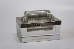 An Edwardian silver mounted glass stamp roller. London 1903. 5 1/2 cm wide