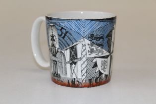 A Norman Makinson festival of Britain Wedgwood mug with coins and guide book