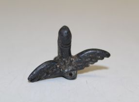 A Roman bronze winged phallus amulet, 2nd Century A.D with suspension loop. 3 x 4cm