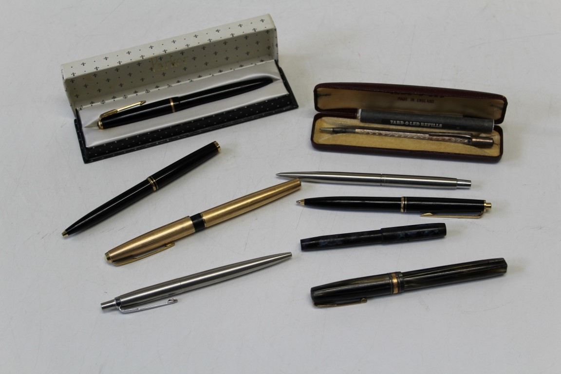 A boxed Parker fountain pen with 14ct gold nib, another gilt metal Parker fountain pen, a Mount