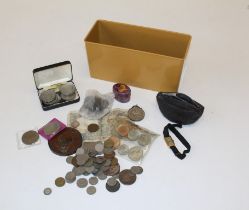 A quantity of coins including a Queen Elizabeth II nine coin proof set, a large bronze Pastry War