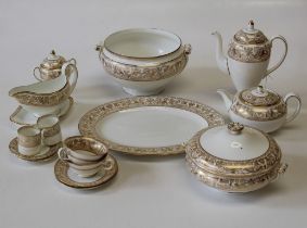 A Wedgwood Gold Florentine part dinner, tea and coffee service, green and black urn backstamps.