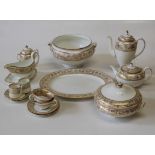 A Wedgwood Gold Florentine part dinner, tea and coffee service, green and black urn backstamps.