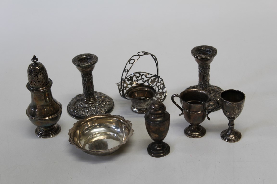 A pair of Queen Elizabeth II silver dwarf candlesticks, Birmingham 1989, 10cm, together with a small