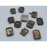 A collection of eleven late 19th / early 20th century silver vesta cases, each with hinged cover.