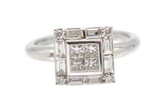 A diamond set 14ct white gold ring, comprising a square mount illusion set to the centre with four