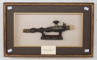 A late 19th century handmade opium pipe from the hill tribe region, northern Vietnam, within a