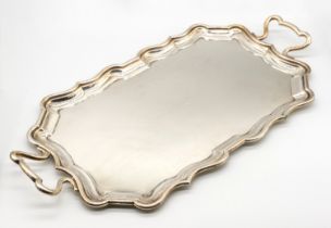 A George V silver two handled tray, scrolled border and stylised handles, hallmarked by Goldsmiths &