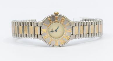 Cartier: a ladies Must de Cartier 21 bi metal steel quartz wristwatch, comprising a signed round