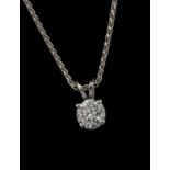 A diamond and 18ct white gold solitaire pendant, comprising a round brilliant cut diamond weighing