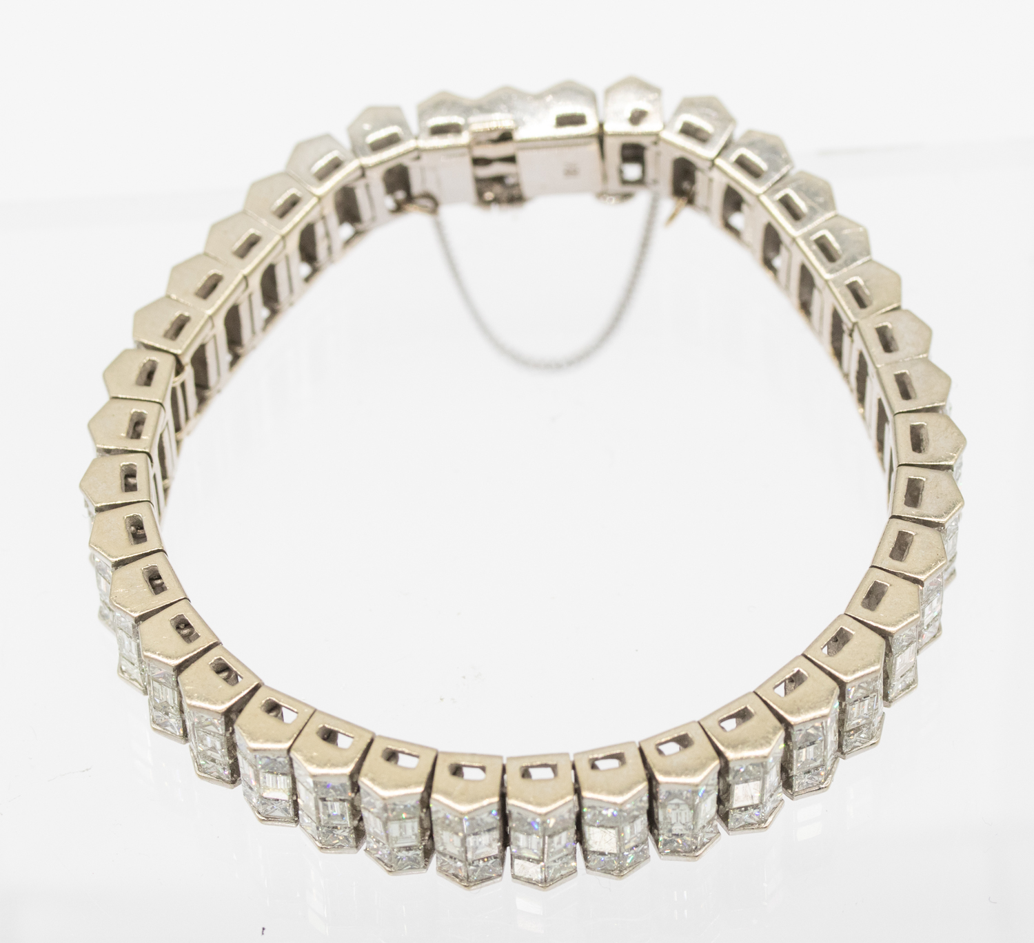 A diamond and 18ct white gold line bracelet with an estimated diamond weight approx 19.45 carats, - Image 6 of 8