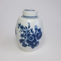 A Caughley tea canister and cover, of ovoid form with cover, printed in blue with the 'Three