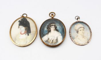 A collection of three portrait miniatures: 1. English School (early 19th Century) portrait of a