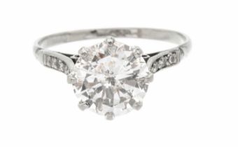A diamond and platinum solitaire ring, comprising a round brilliant cut diamond weighing approx 2.