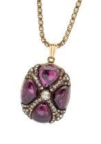 A 19th century French garnet and diamond set gold locket, comprising an oval form, set with four