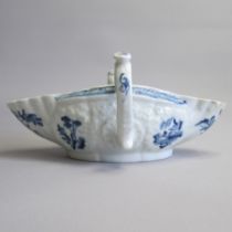 A Worcester blue and white small sized twin handled sauce boat, painted with a Chinese lake scene,