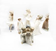 Lladro: four figures including a young native north American squaw, a young couple wearing clown and