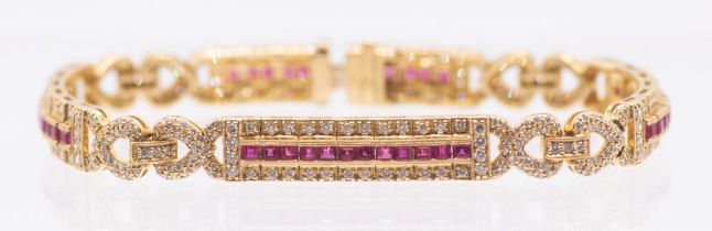 A ruby and diamond 18ct gold bracelet, comprising elongated panels, each set to the centre with a