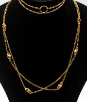 An early 20th century fancy guard gold stone set chain, comprising eight carved bears holding