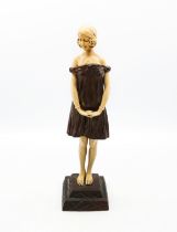 After D.H. Chiparus Art Deco style figure 'Innocence' on a stepped metal base. Height approx 31.5cm.
