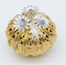 Christopher Nigel Lawrence - a parcel gilt globular shaped silver pomander, with silver leaves and