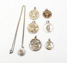 Georg Jensen Ltd - a selection of mixed silver St Christopher pendants, all with traditional