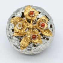 Christopher Nigel Lawrence - a textured silver pomander of globular shape with gilt flowers and