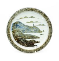 David Eeles (1933-2015) studio pottery plate decorated with a coastal scene. Diameter approx 28cm.