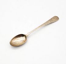 Liberty & Co - an Arts & Crafts silver spoon, having planished handle with engraved designed