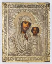 A 19th century Russian icon. Silver gilt front, with indistinct Russian silver marks to the bottom