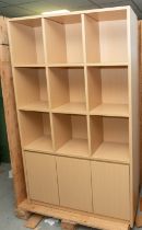 Crate containing 2 beech cubed display units.