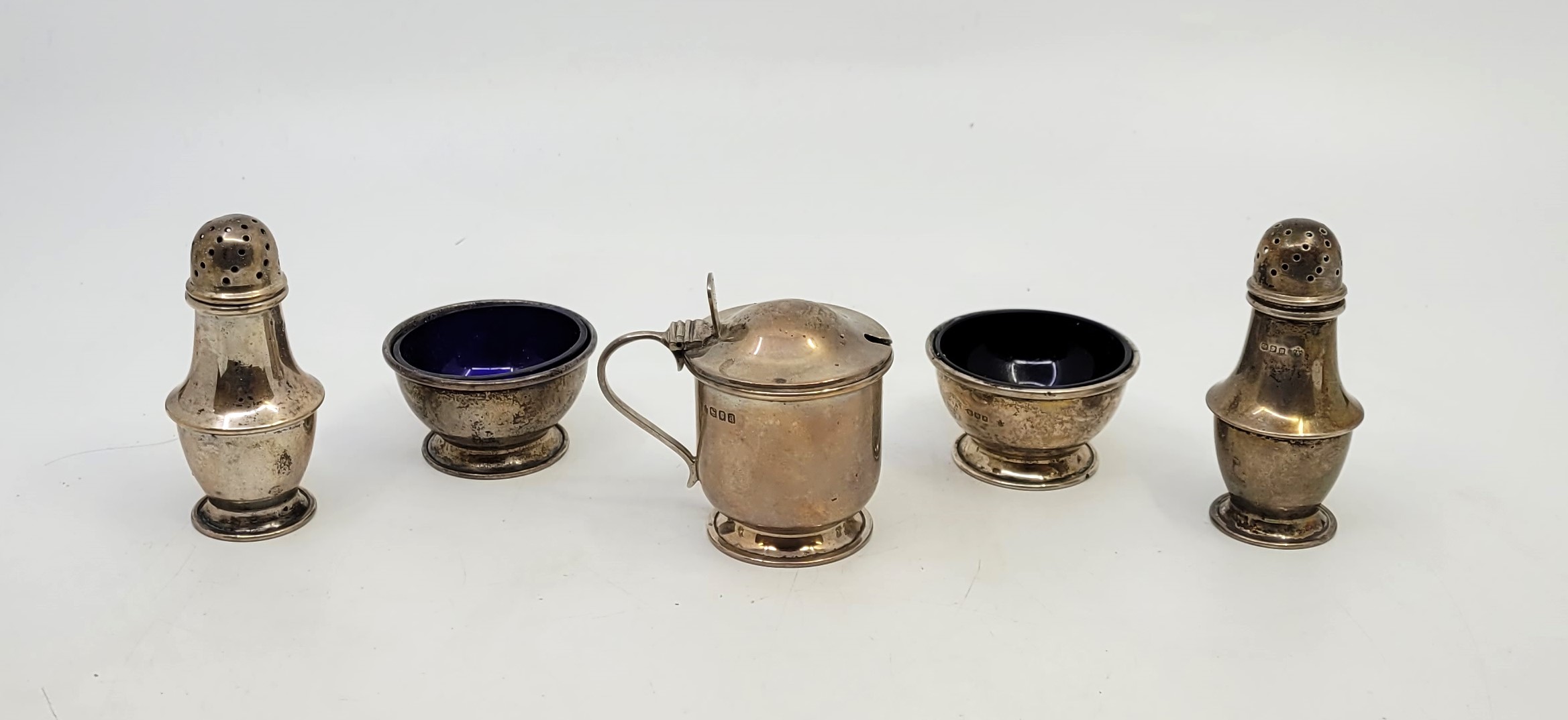 A five piece silver cruet set, by Edward Barnard & Sons Ltd, London 1916, comprising a pair of - Image 5 of 9