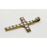 A precious yellow metal, diamond and cultured pearl cross, set rows of cultured pearls with pairs of